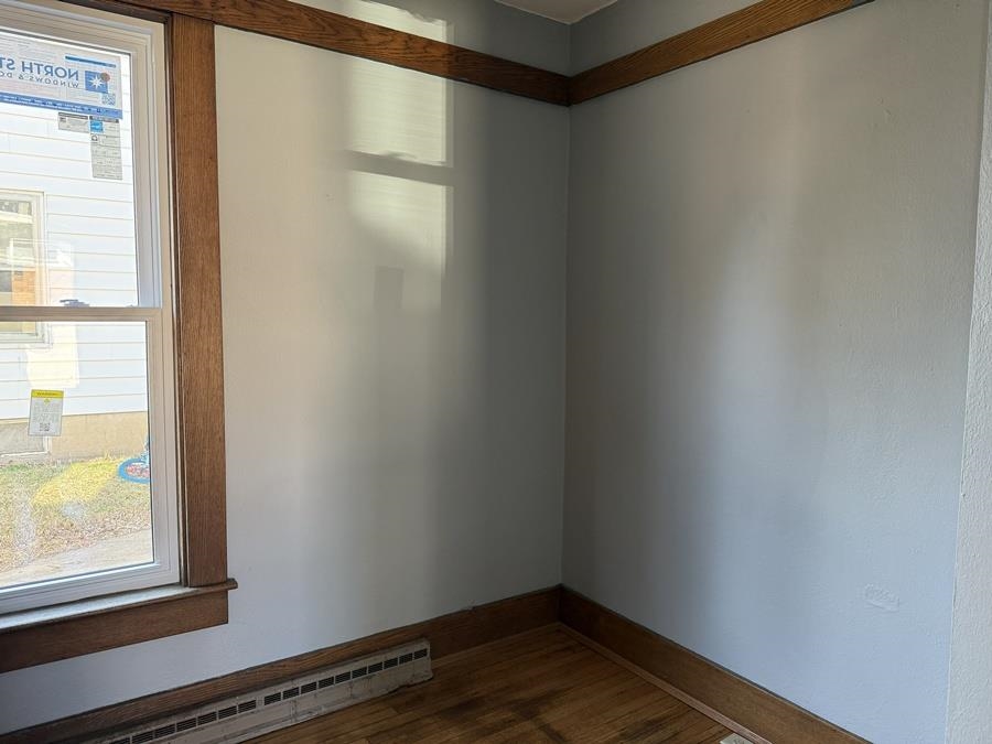 816 West Pleasant Street Freeport, IL 61032 - Photo 25 of 42 a small space with wooden floor and windows