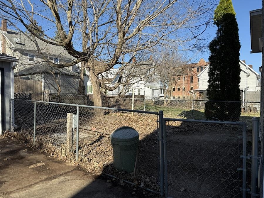 816 West Pleasant Street Freeport, IL 61032 - Photo 5 of 42 a two chairs sitting in backyard of the house