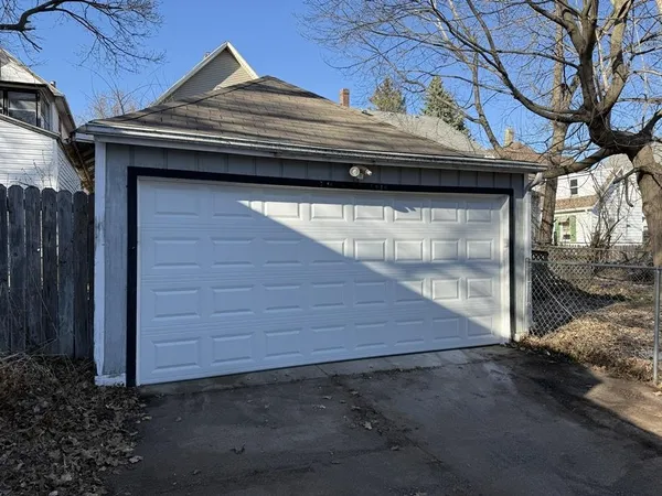 a side view of a house with a yard