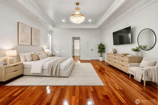 a spacious bedroom with a bed and window