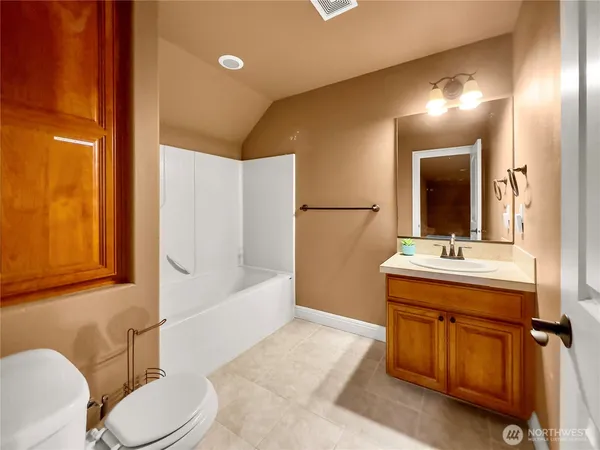 a view of a kitchen from the hallway