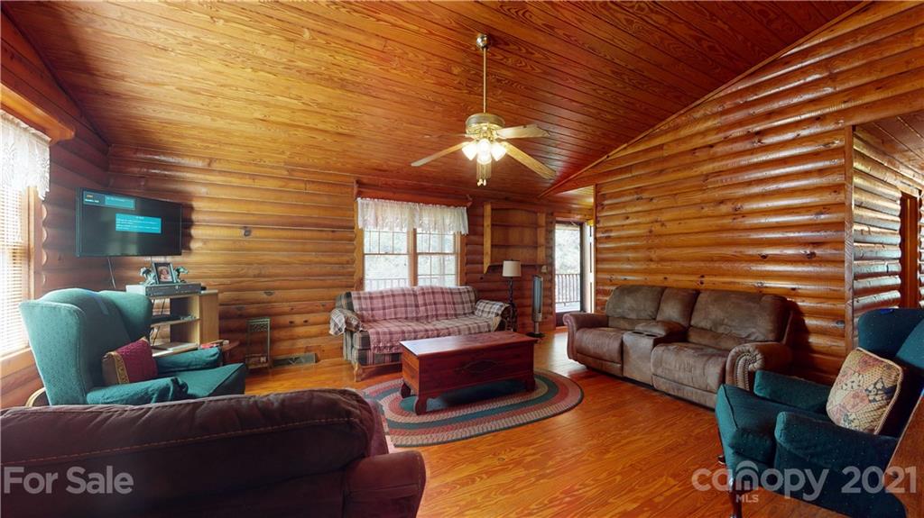 373 North Burris Road Sharon, SC 29742 - Photo 22 of 36 a living room with furniture ceiling fan and a window