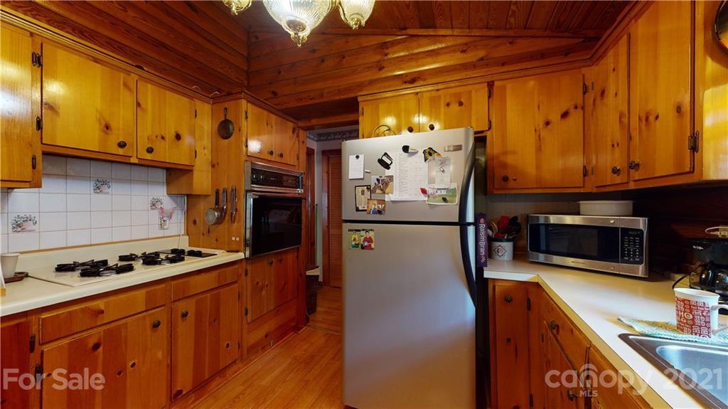 373 North Burris Road Sharon, SC 29742 - Photo 28 of 36 a kitchen with stainless steel appliances granite countertop a refrigerator and a stove top oven