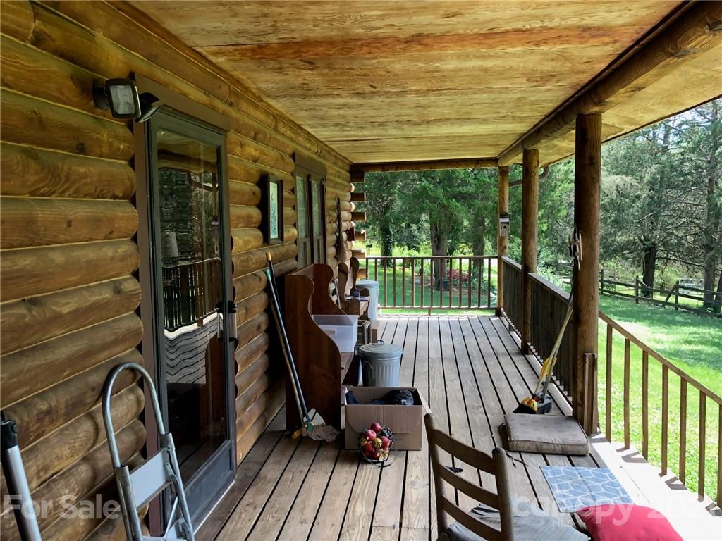 373 North Burris Road Sharon, SC 29742 - Photo 5 of 36 a view of a balcony with chairs and wooden floor