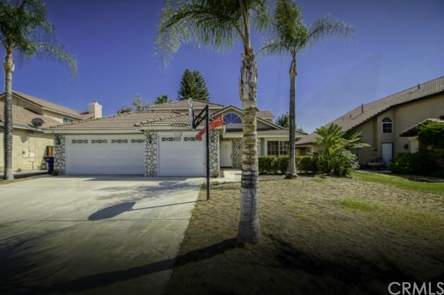 20423 Sugar Gum Road Riverside, CA 92508 - Photo 1 of 1 Traditional exterior w/ river rock, 3-car garage, and palm trees!