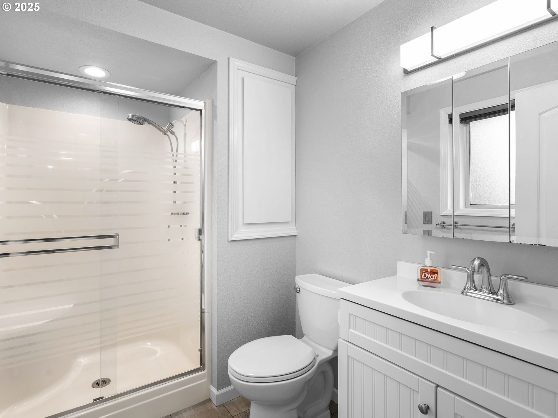 555 Southwest 7th Street Gresham, OR 97080 - Photo 21 of 48 a bathroom with a granite countertop sink toilet and shower