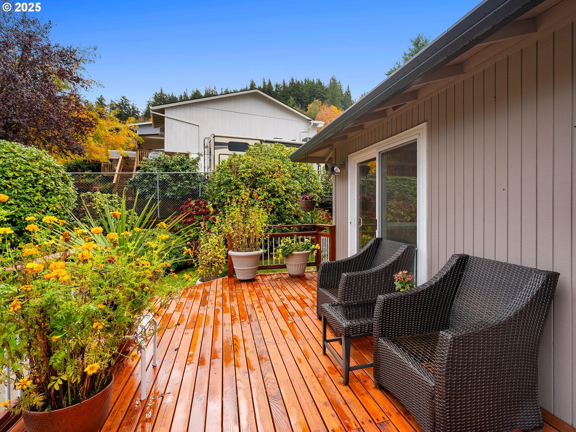 555 Southwest 7th Street Gresham, OR 97080 - Photo 39 of 48 a view of a patio with couches table and chairs and potted plants
