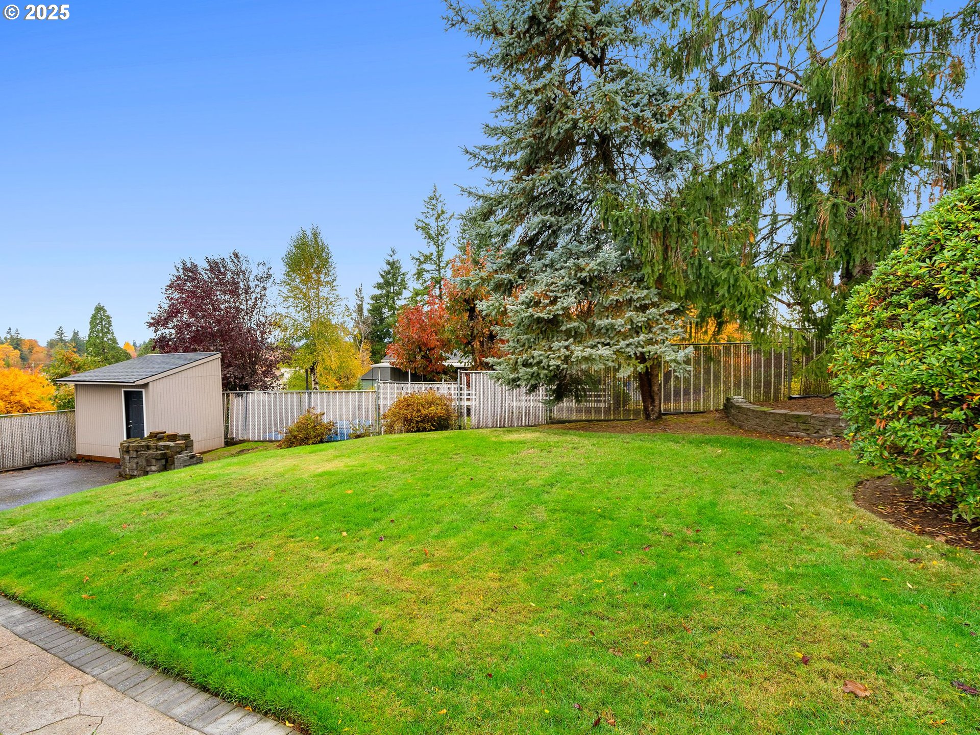 555 Southwest 7th Street Gresham, OR 97080 - Photo 6 of 48 a view of a house with a yard