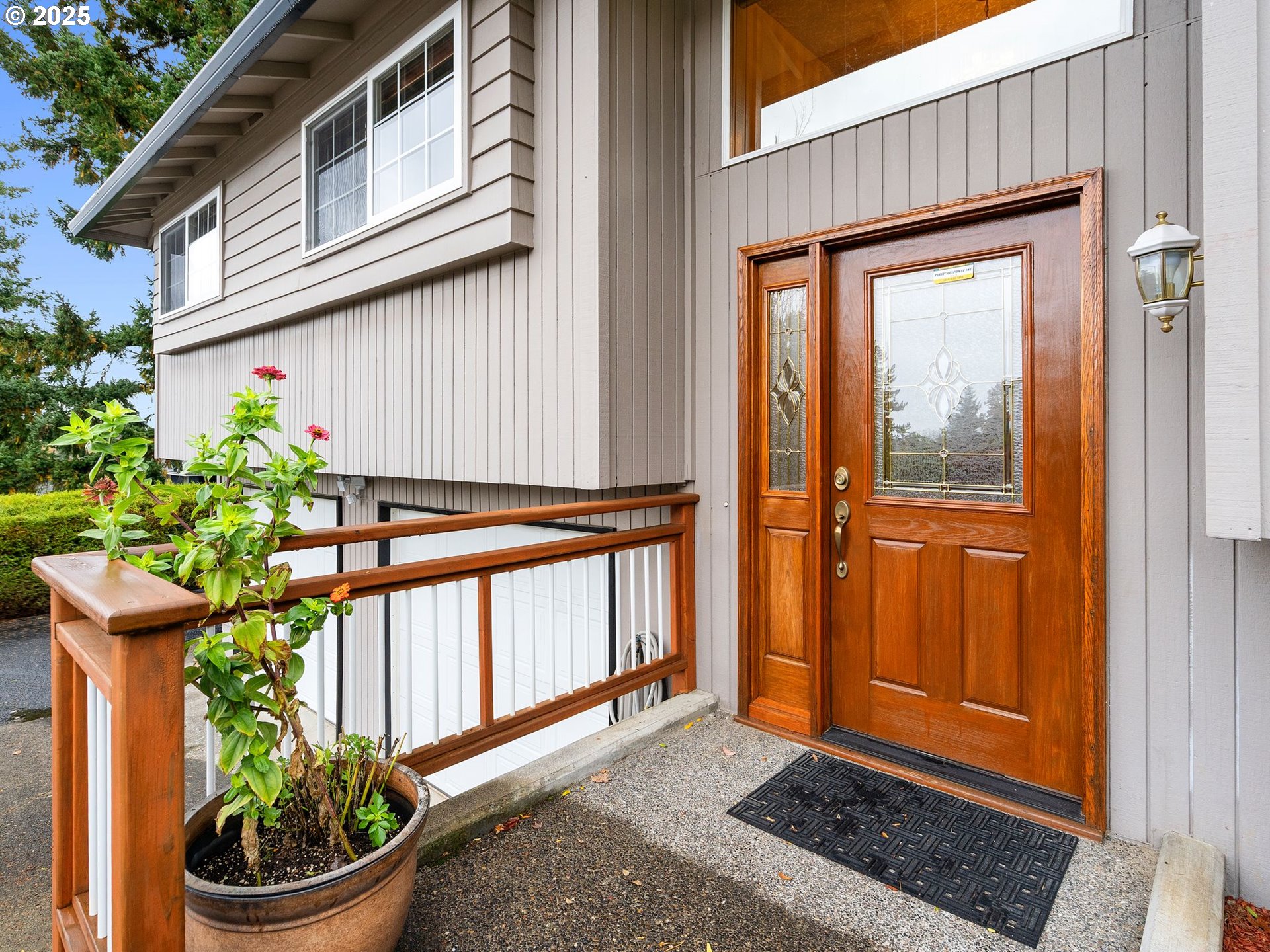 555 Southwest 7th Street Gresham, OR 97080 - Photo 7 of 48 a front view of a house with a garden