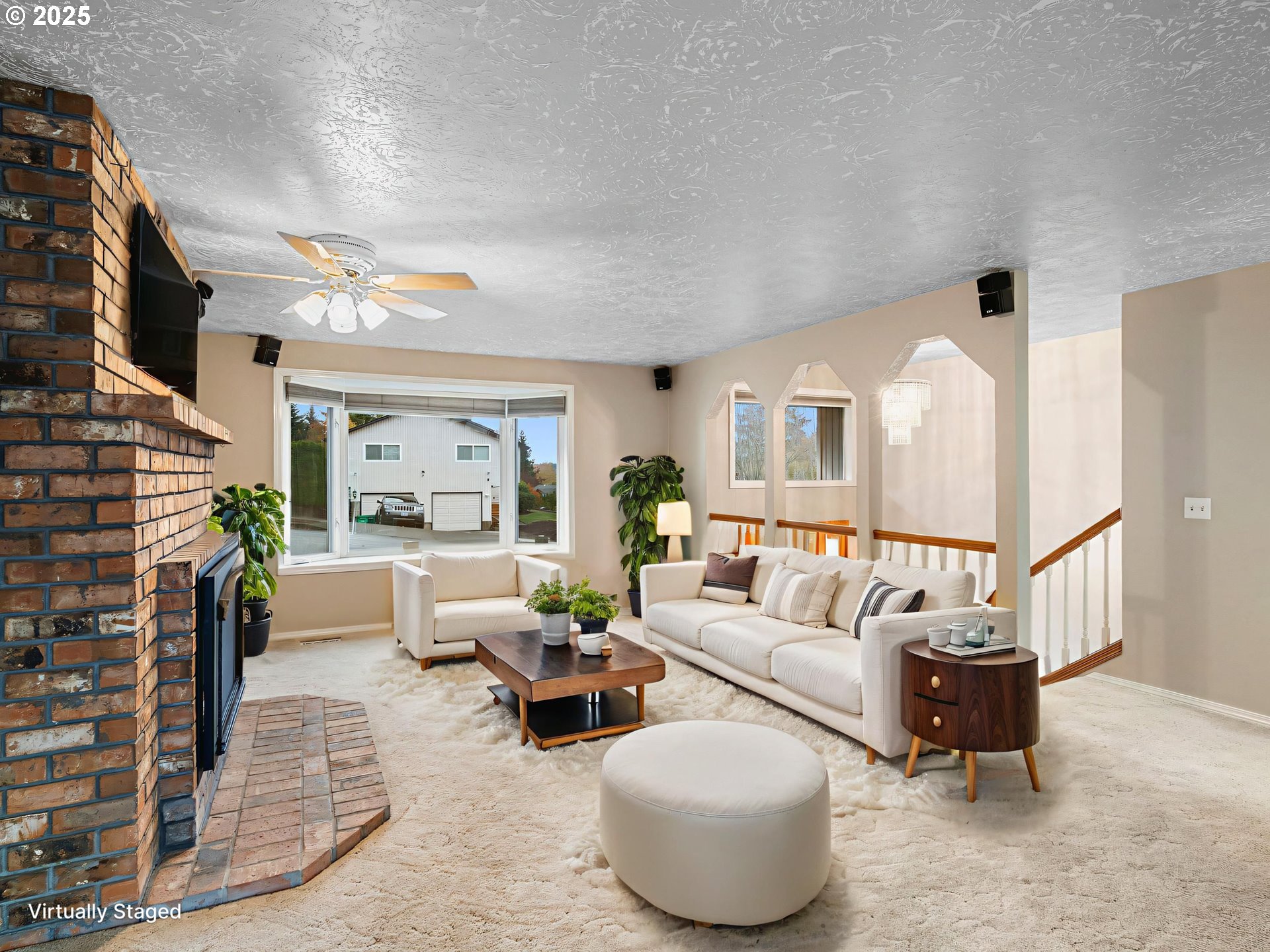 555 Southwest 7th Street Gresham, OR 97080 - Photo 10 of 48 a living room with furniture and a fireplace
