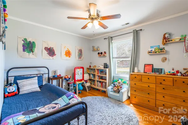 a children room with toys and a couch