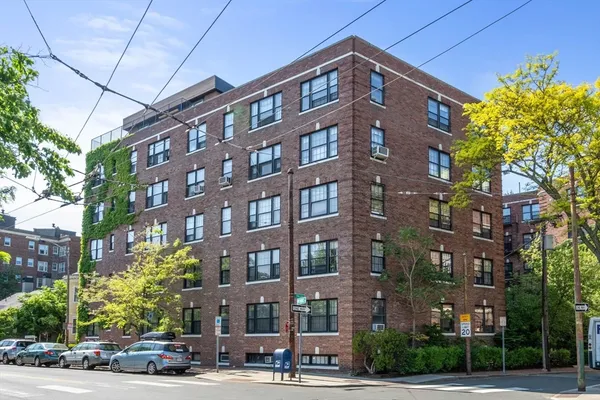 a front view of a building with street view