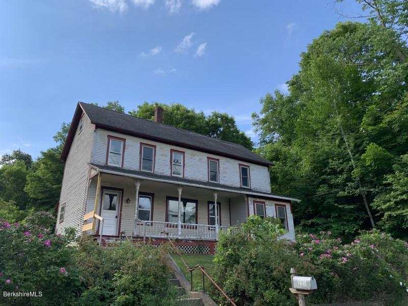 223 East Road Adams, MA 01220 - Photo 1 of 22 a front view of a house with a yard