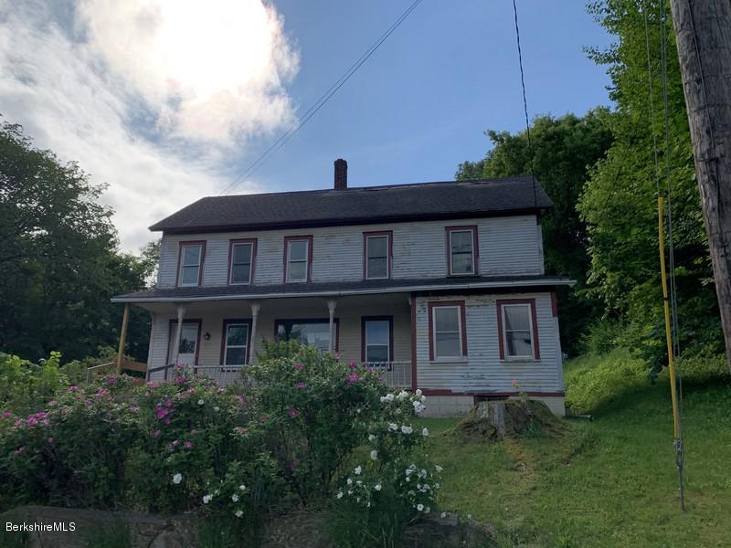 223 East Road Adams, MA 01220 - Photo 3 of 22 a front view of a house with garden