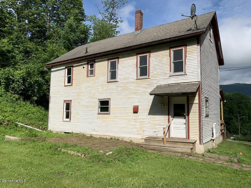 223 East Road Adams, MA 01220 - Photo 7 of 22 a front view of a house with a yard