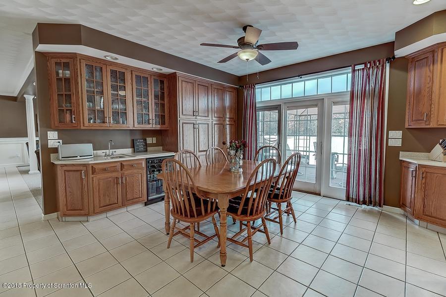 360 Upper Demunds Road Dallas, PA 18612 - Photo 12 of 40 a view of a dining room with furniture window and outside view