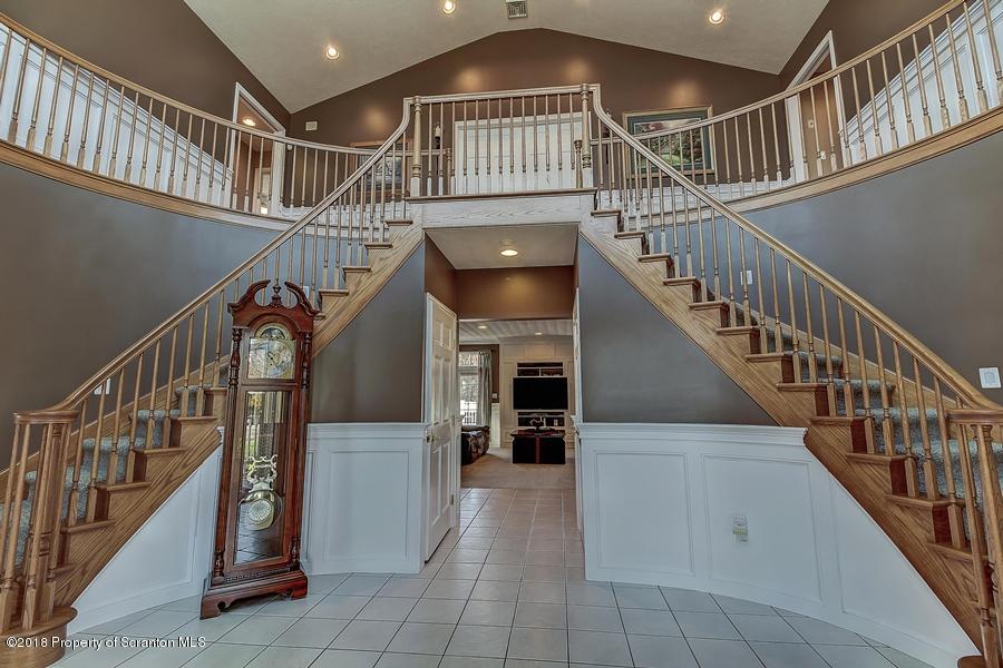 360 Upper Demunds Road Dallas, PA 18612 - Photo 2 of 40 a view of entryway and hall with wooden floor