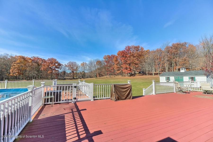 360 Upper Demunds Road Dallas, PA 18612 - Photo 31 of 40 a view of a swimming pool and outdoor space