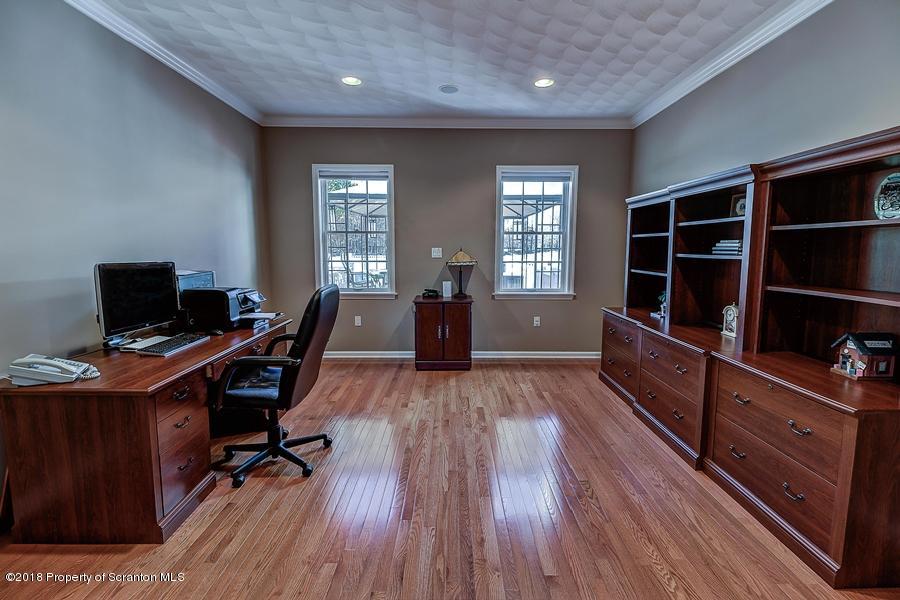 360 Upper Demunds Road Dallas, PA 18612 - Photo 8 of 40 a view of a workspace with furniture and windows