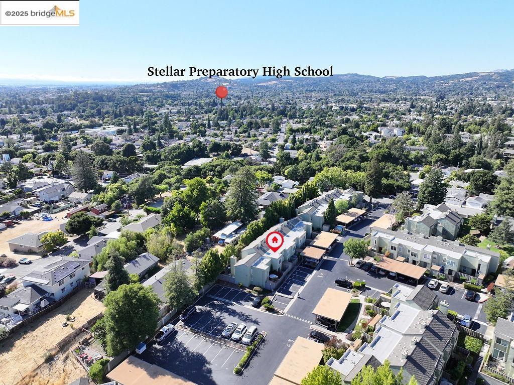 an aerial view of a city with lots of residential buildings