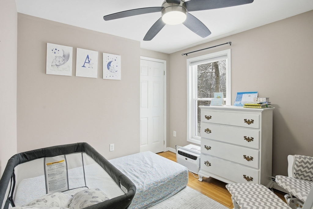 66 Buttonwood Avenue Sutton, MA 01590 - Photo 27 of 42 a bedroom with a bed and a dresser