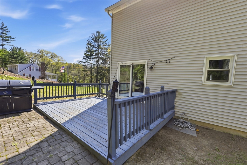 66 Buttonwood Avenue Sutton, MA 01590 - Photo 40 of 42 a view of a wooden deck