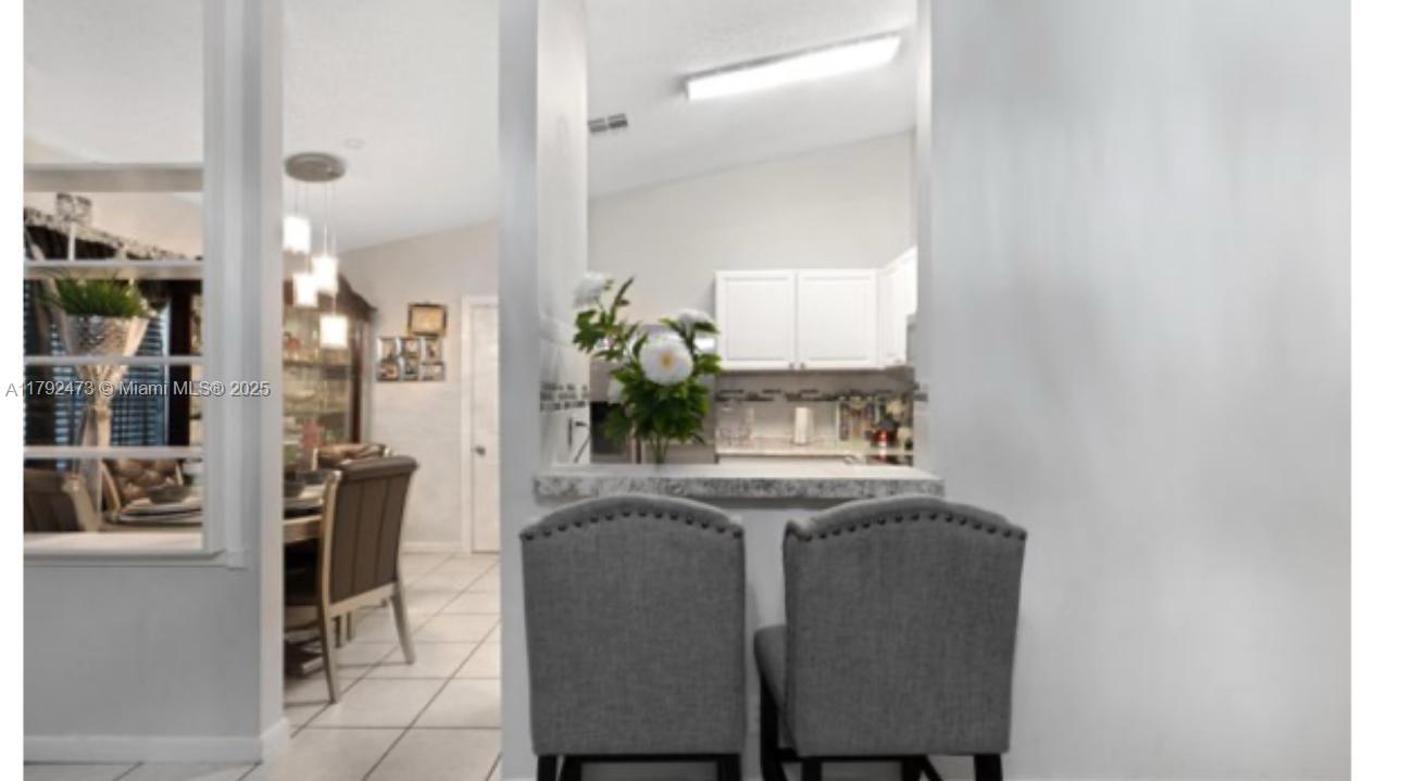 11233 Model Circle West Boca Raton, FL 33428 - Photo 2 of 13 a living room with furniture and window