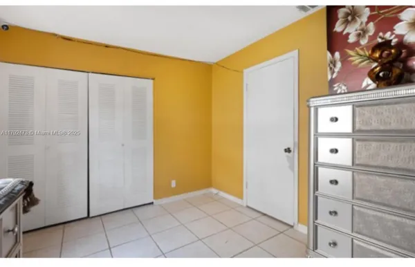 a bathroom with a shower curtain