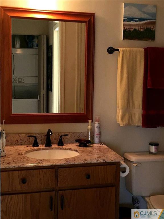 52 Bolton Court Somerset, NJ 08873 - Photo 13 of 18 a bathroom with a sink and a mirror