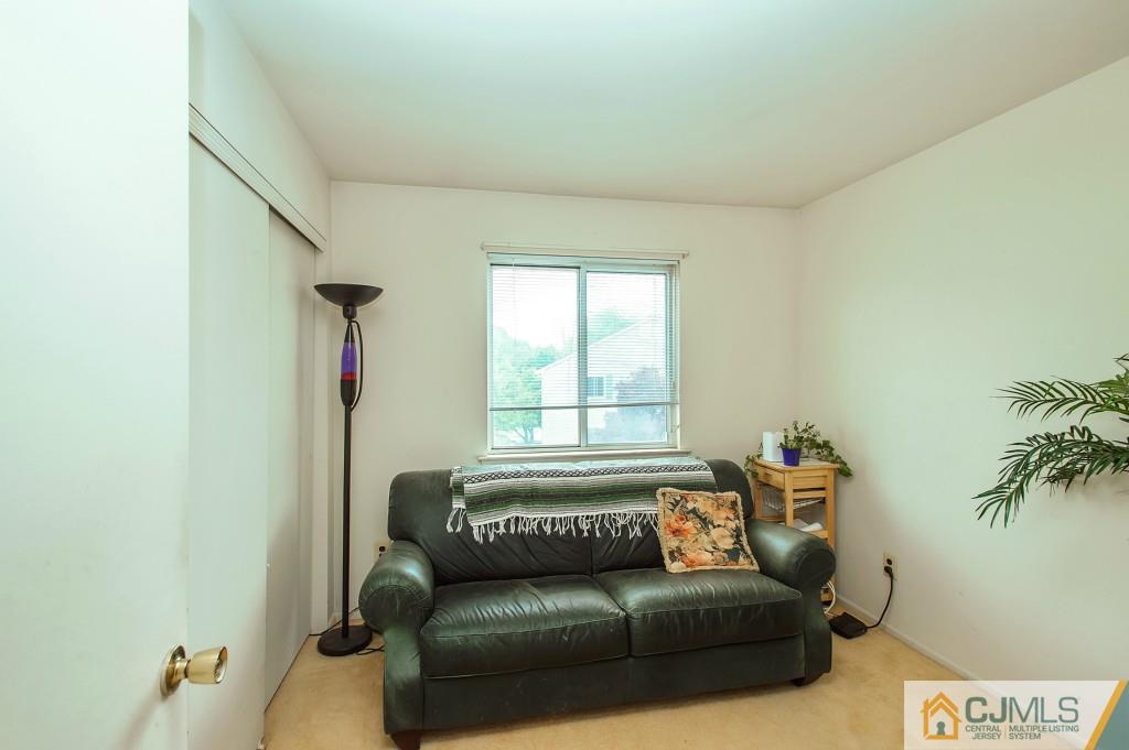 52 Bolton Court Somerset, NJ 08873 - Photo 15 of 18 a living room with furniture and a window