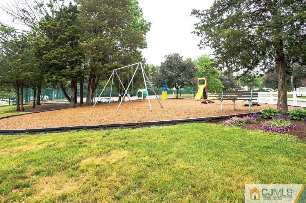 52 Bolton Court Somerset, NJ 08873 - Photo 18 of 18 a view of a backyard with basketball court
