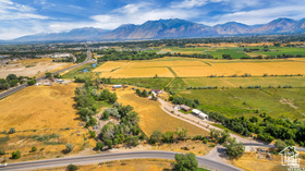 19 East Southfield Road Spanish Fork, UT 84660 - Photo 6 of 74 Overview of rural landscape featuring a mountainous background
