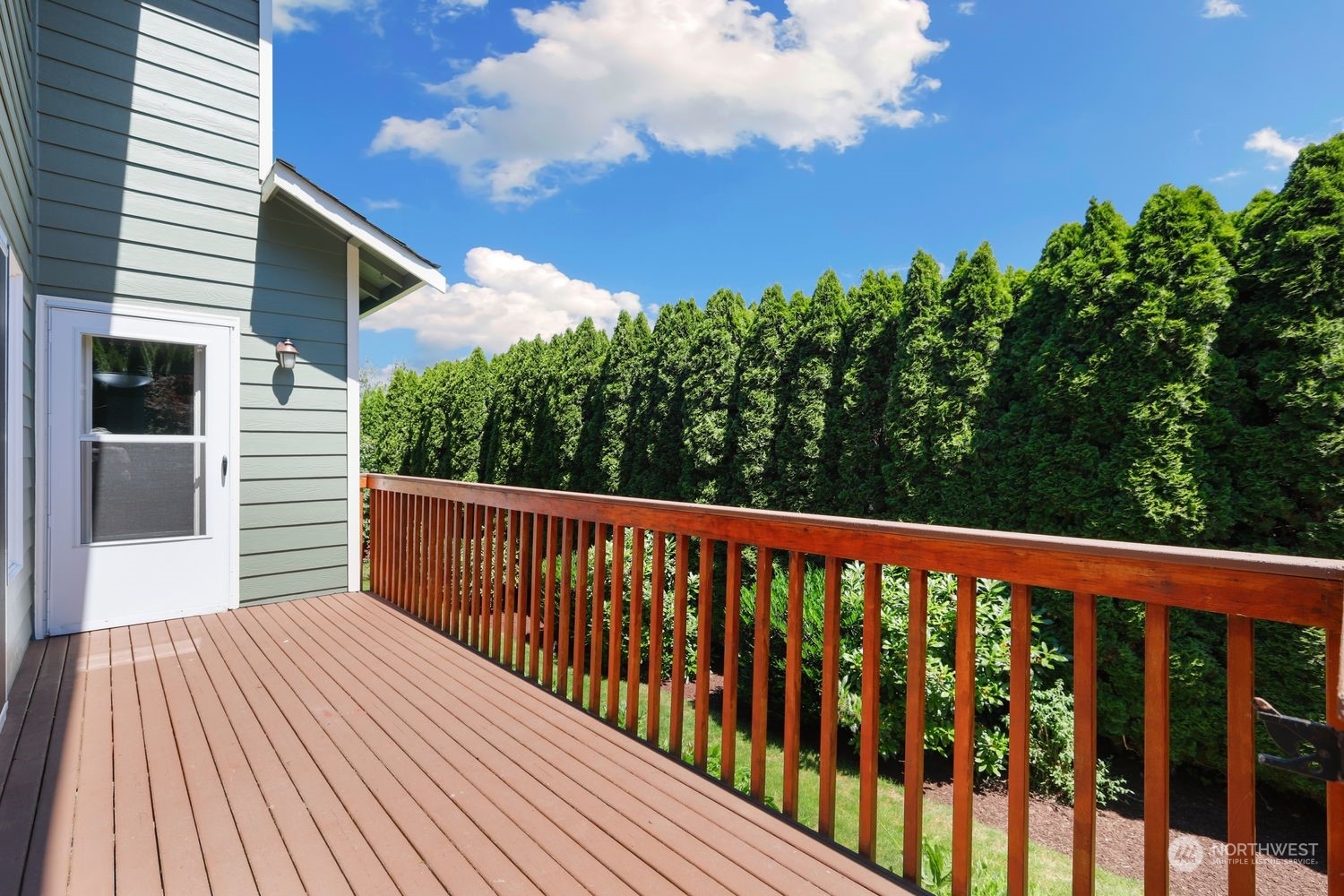 23509 25th Drive Southeast Bothell, WA 98021 - Photo 33 of 39 a balcony with wooden floor and fence