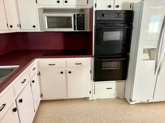 an empty room with cabinet