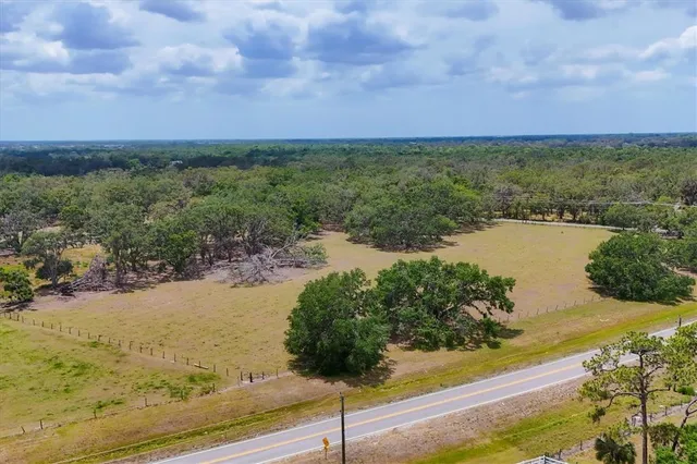 a view of a street with an ocean beach