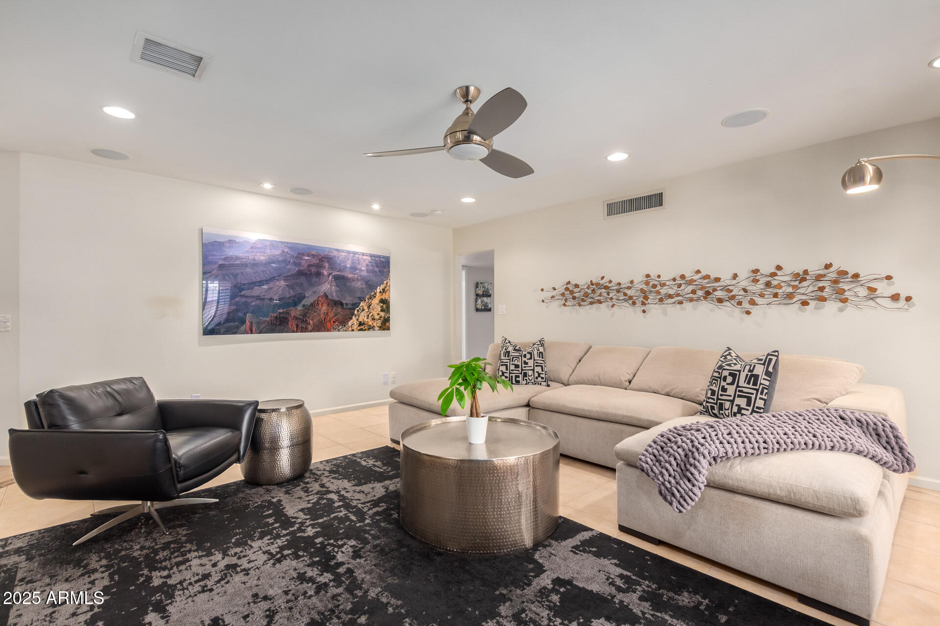 2909 East Las Rocas Drive Phoenix, AZ 85028 - Photo 12 of 48 a living room with furniture and a couch