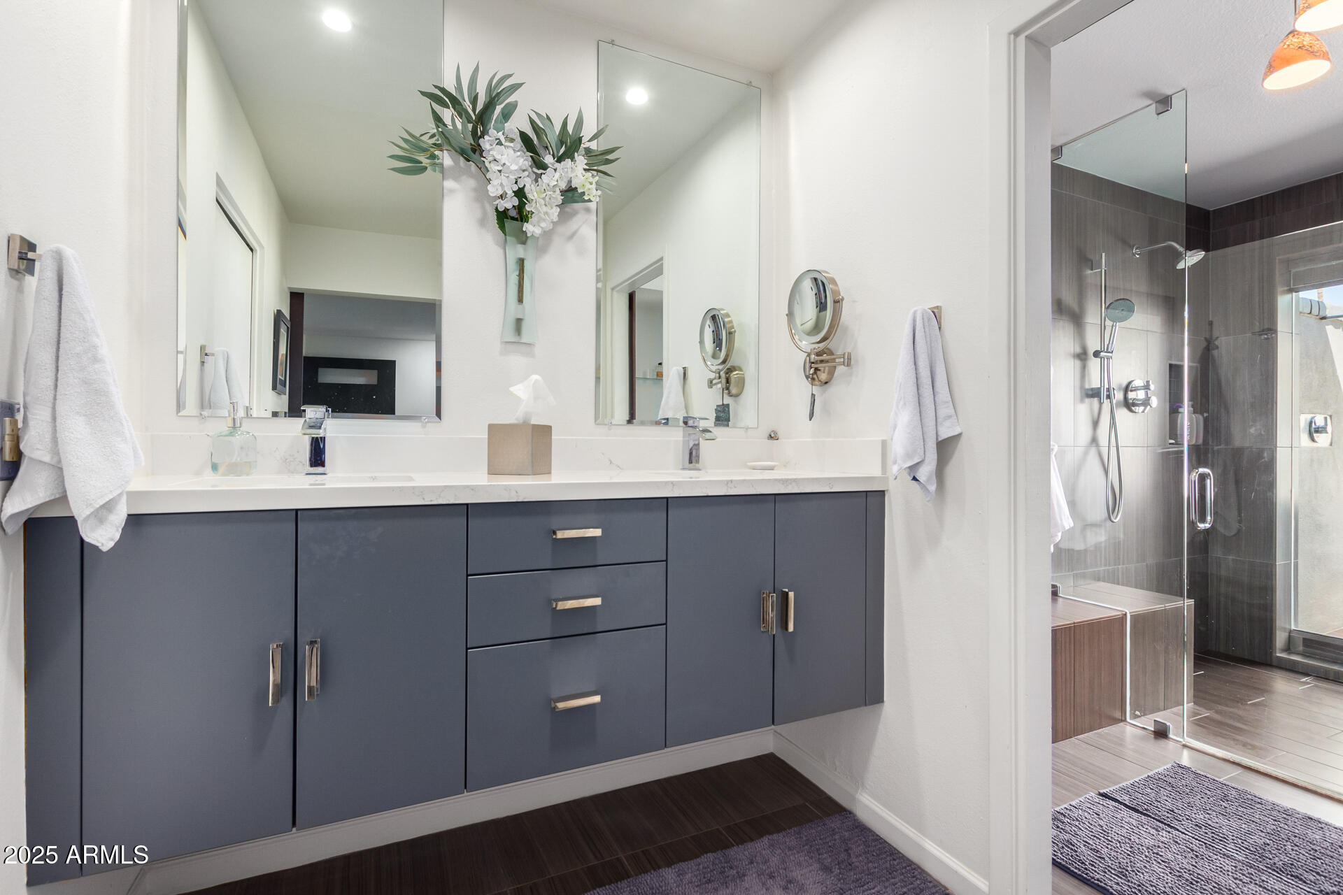 2909 East Las Rocas Drive Phoenix, AZ 85028 - Photo 19 of 48 a bathroom with a double vanity sink mirror and shower