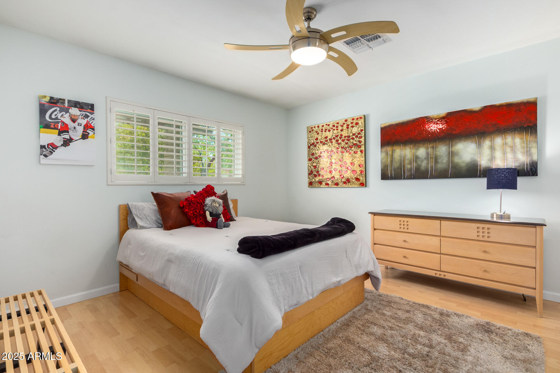 2909 East Las Rocas Drive Phoenix, AZ 85028 - Photo 24 of 48 a bedroom with a bed and a dresser