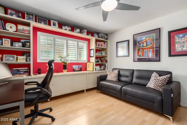 a view of a chairs and table in patio