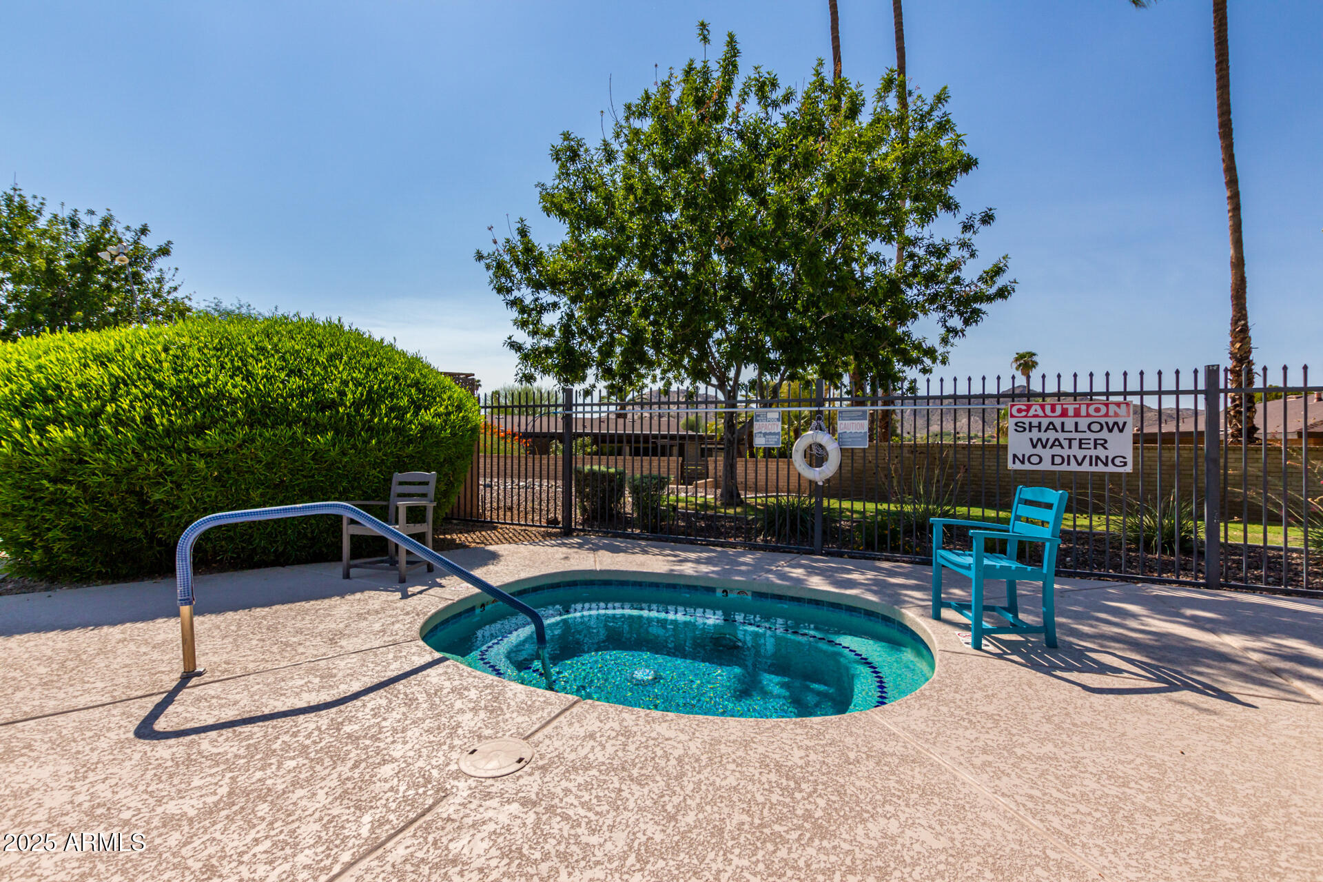 2909 East Las Rocas Drive Phoenix, AZ 85028 - Photo 38 of 48 a view of a swimming pool with a patio
