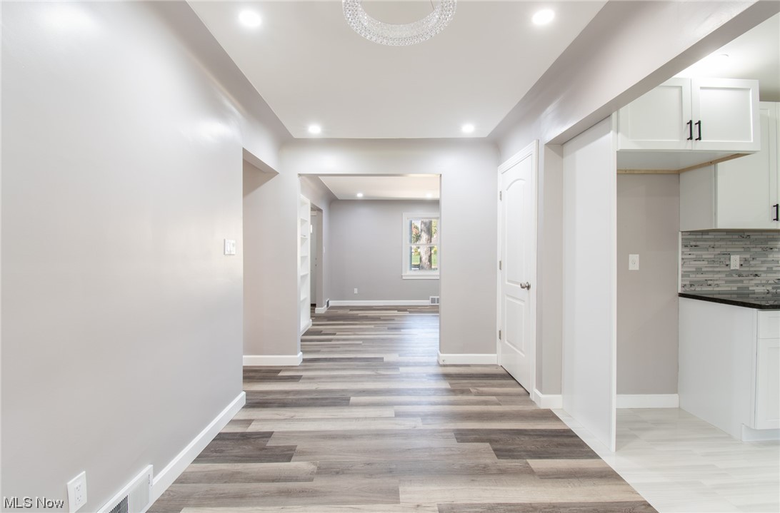 1097 South Meridian Road Youngstown, OH 44511 - Photo 12 of 29 Corridor featuring light hardwood flooring