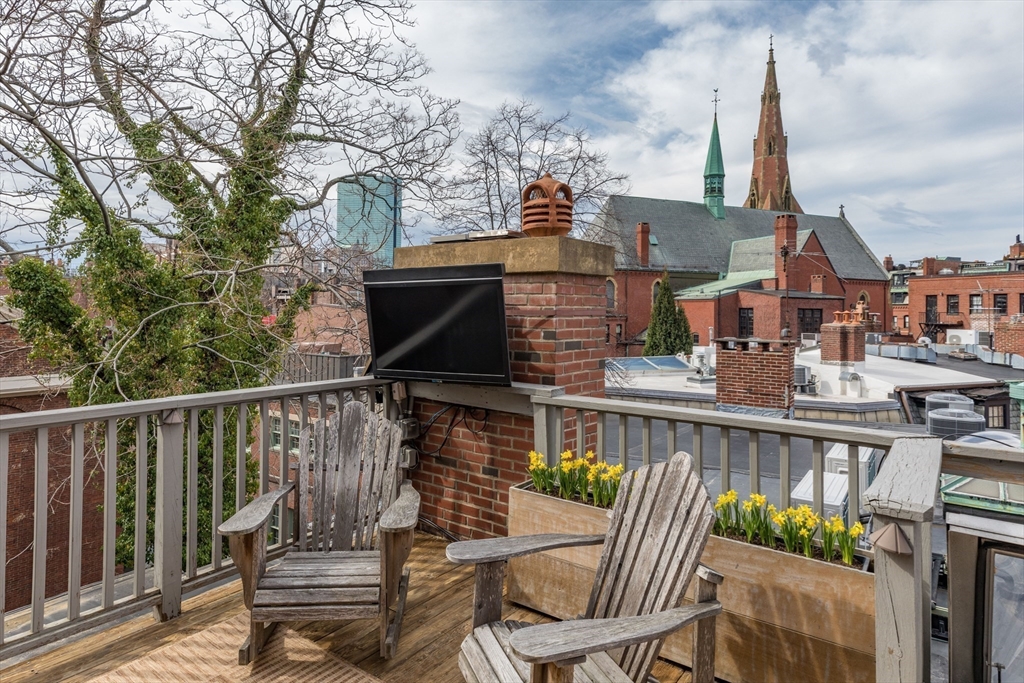 3 River St Place Boston, MA 02114 - Photo 27 of 28 a view of balcony with furniture