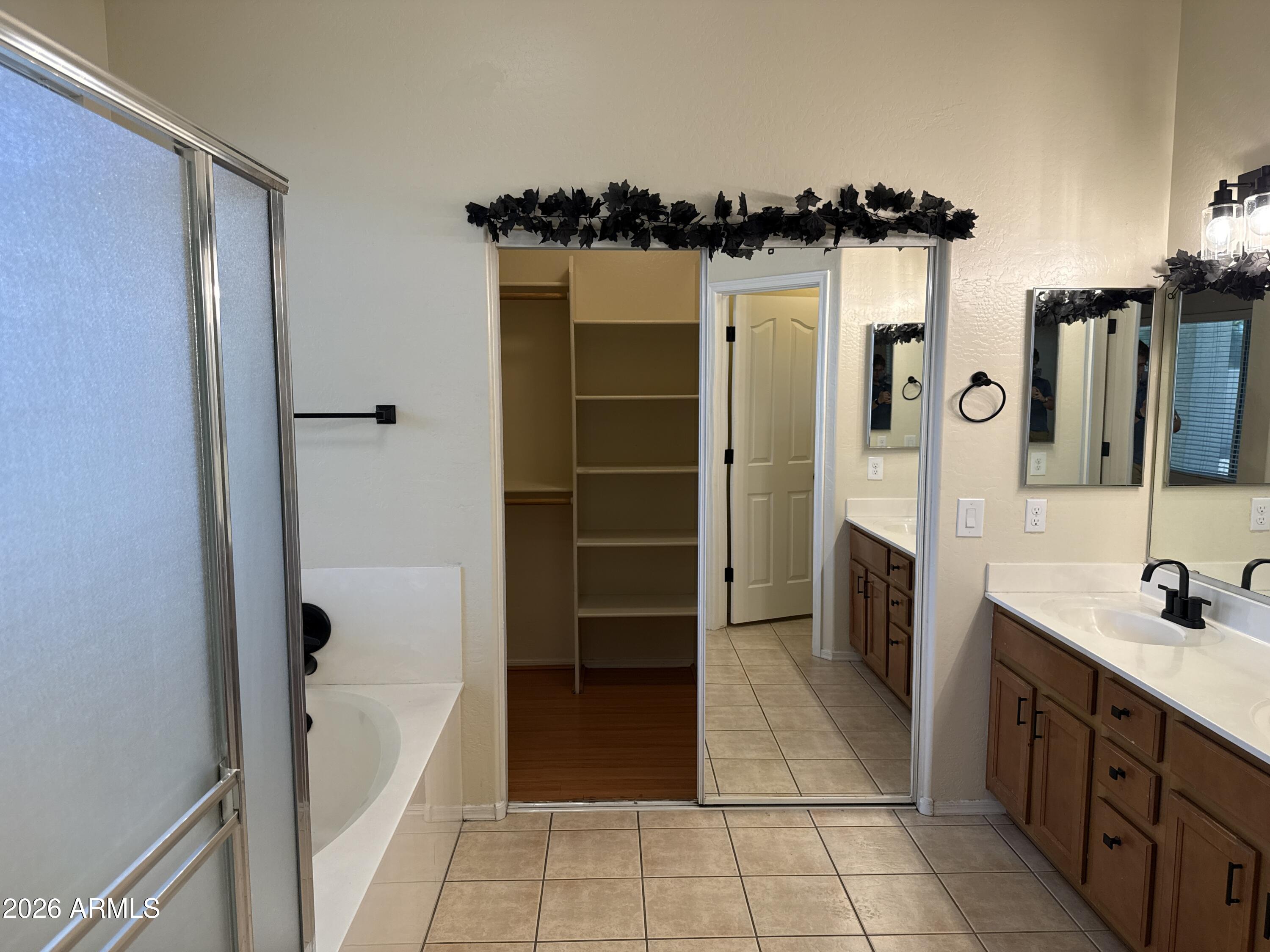 9630 West Reno View Drive Peoria, AZ 85345 - Photo 9 of 21 a view of a walk in closet
