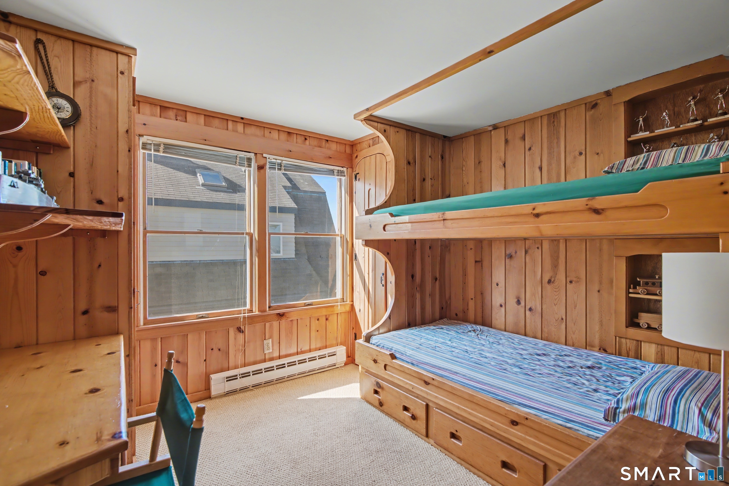 217 West Shore Avenue Groton, CT 06340 - Photo 16 of 34 a bedroom with a bed and wooden floor