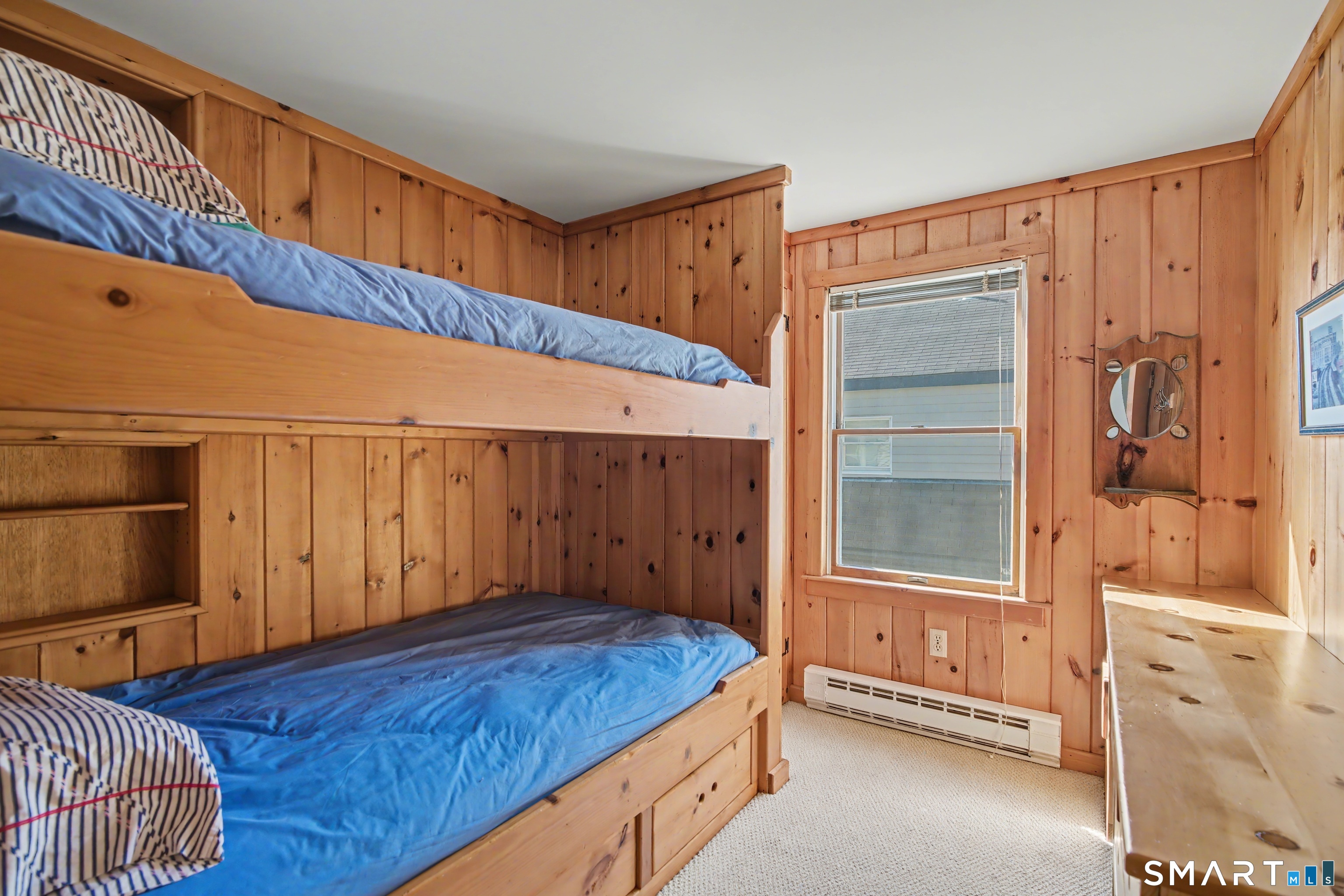 217 West Shore Avenue Groton, CT 06340 - Photo 17 of 34 a view of a bedroom with bed and furniture