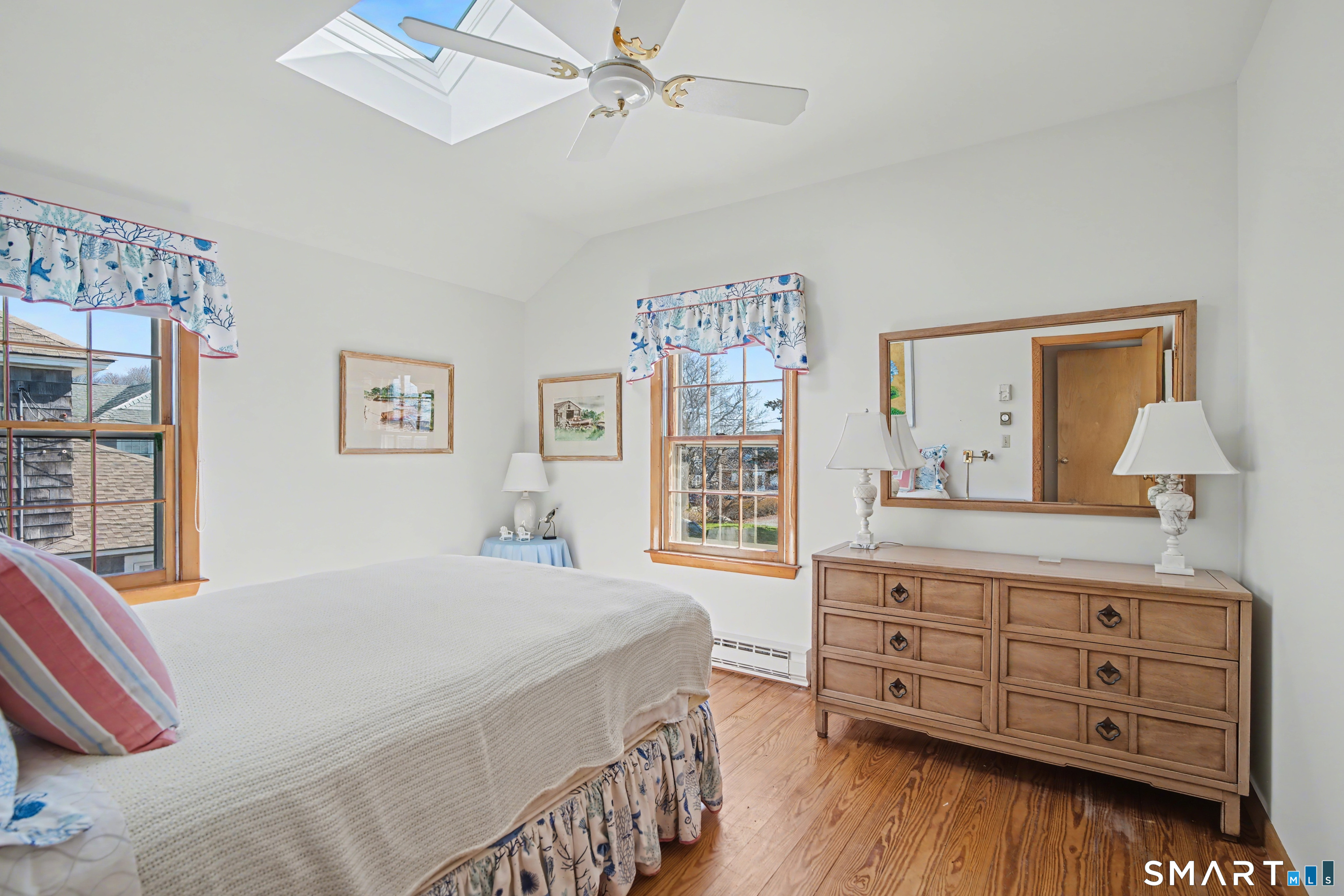 217 West Shore Avenue Groton, CT 06340 - Photo 18 of 34 a bedroom with a bed and a dresser