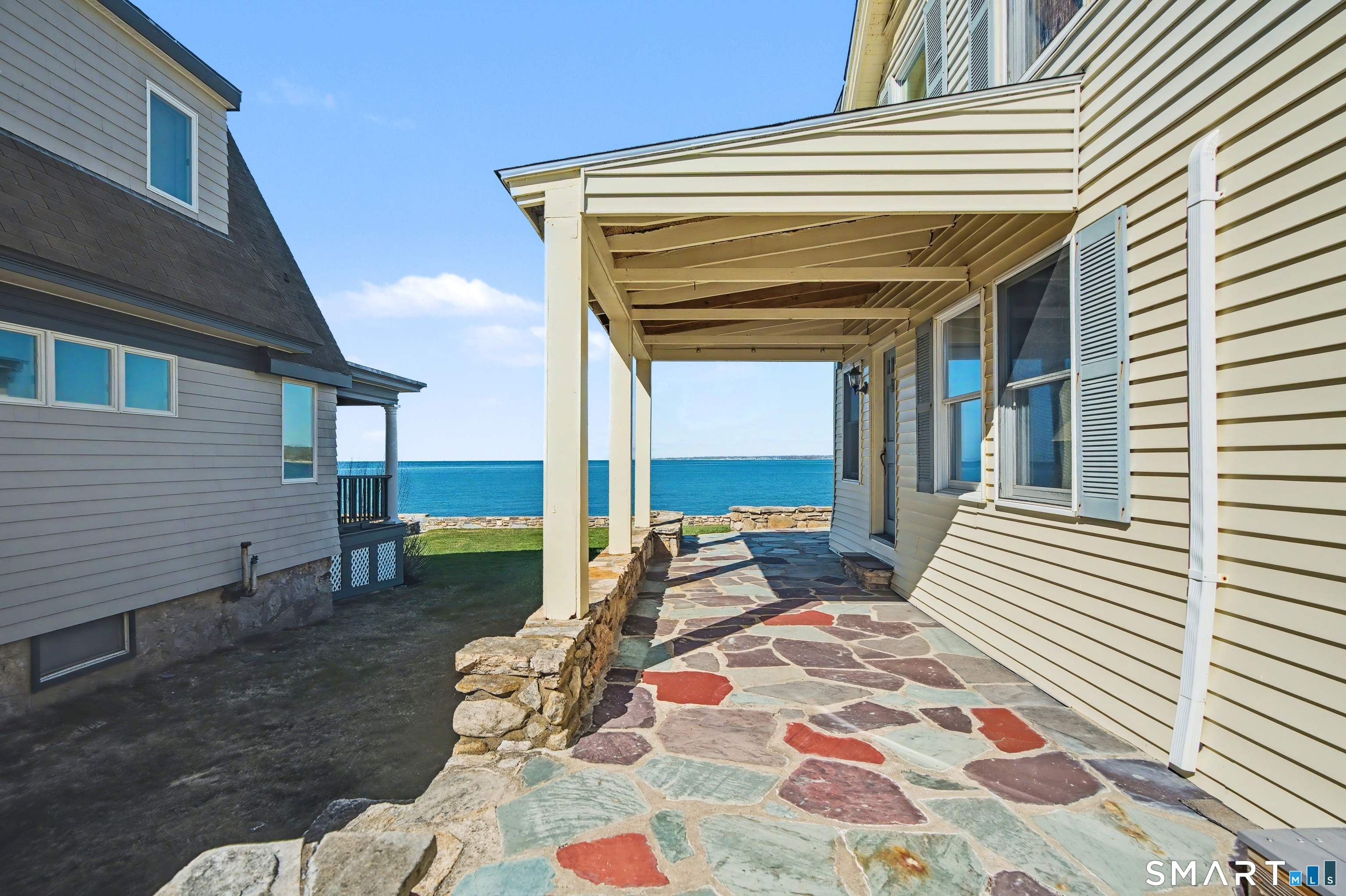 217 West Shore Avenue Groton, CT 06340 - Photo 23 of 34 a bedroom with a bed and a window