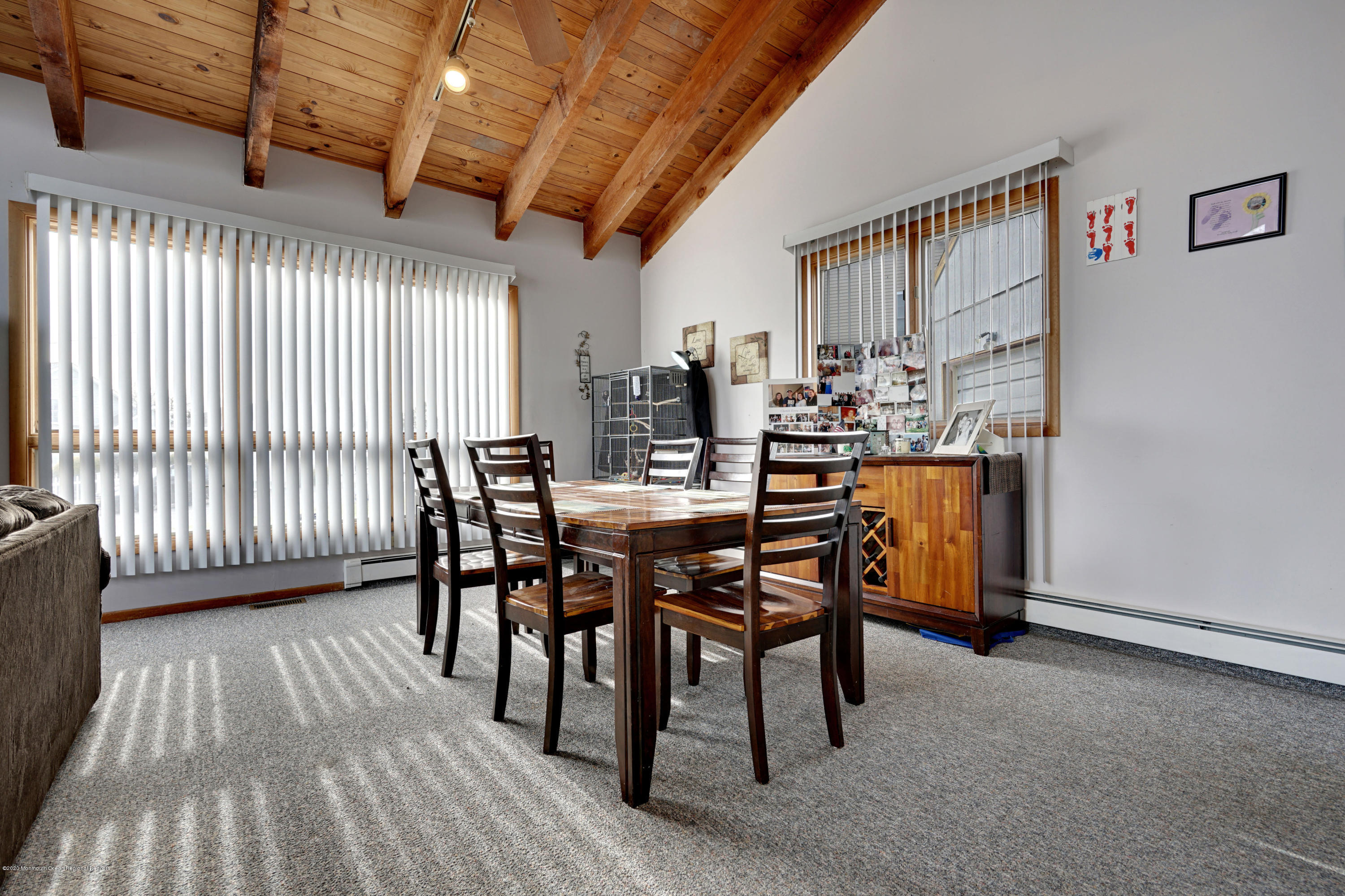 1761 Whitcomb Road Forked River, NJ 08731 - Photo 13 of 41 a view of a dining room with furniture and wooden floor