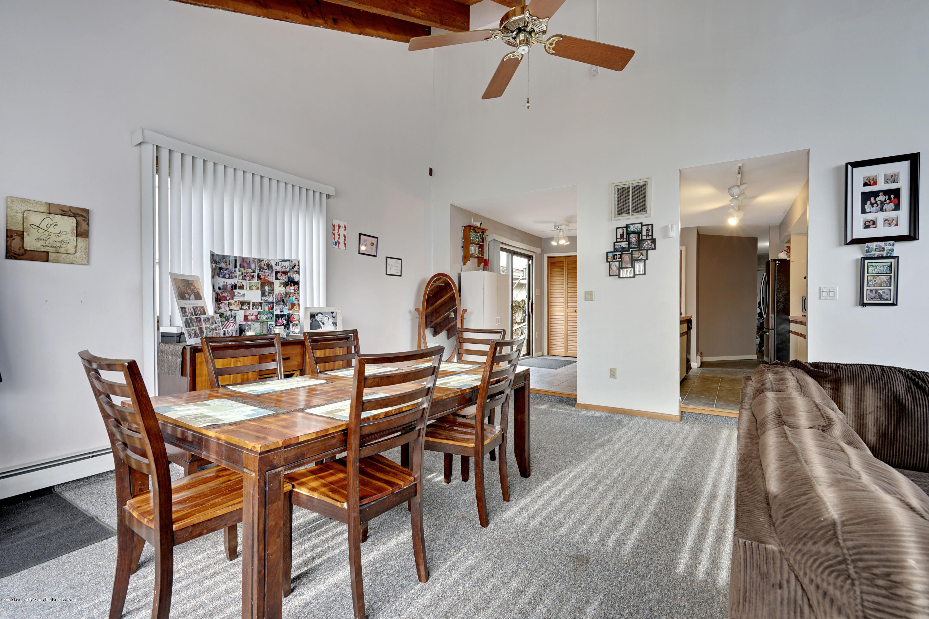 1761 Whitcomb Road Forked River, NJ 08731 - Photo 14 of 41 a view of a dining room with furniture and wooden floor