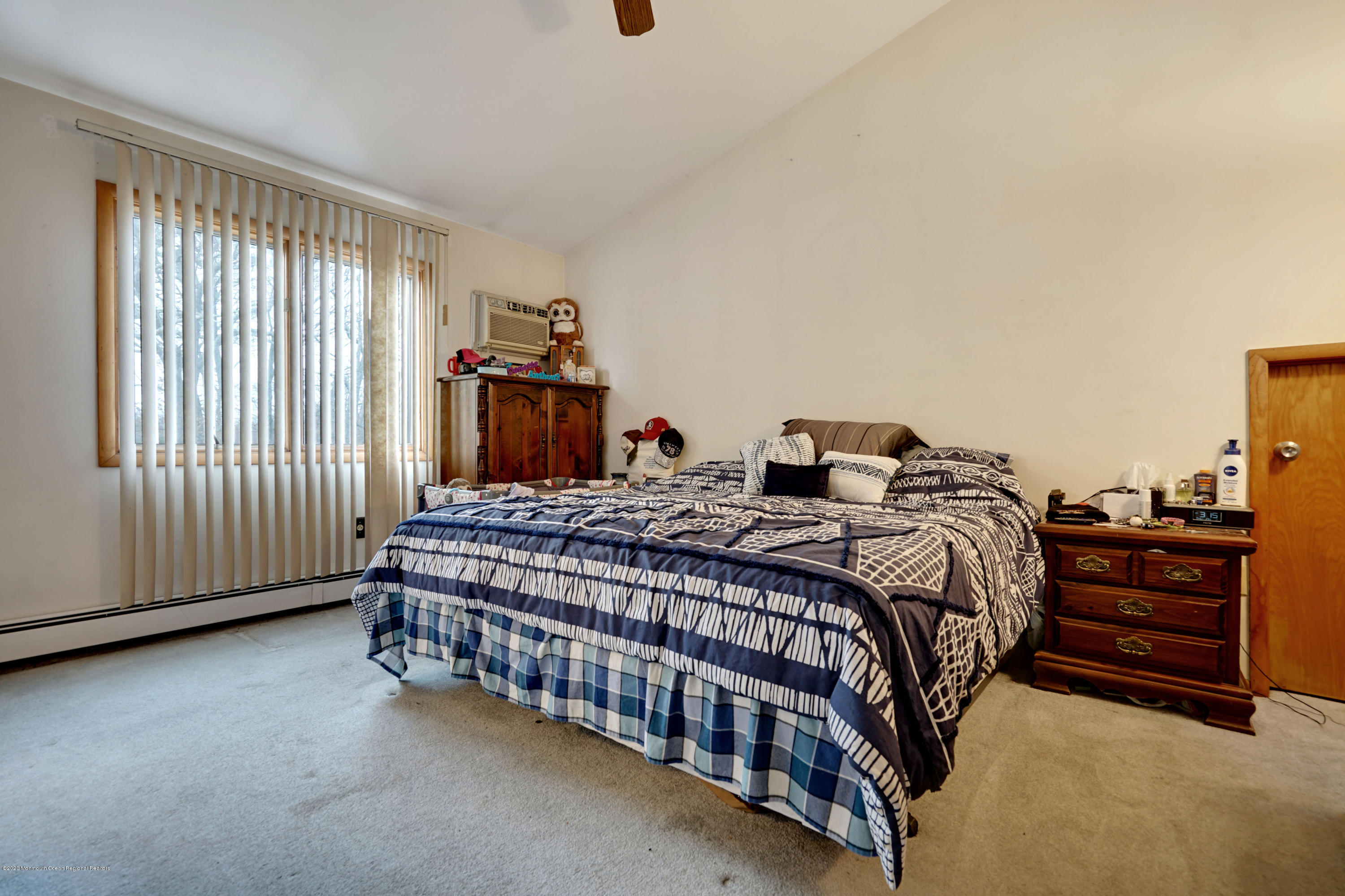1761 Whitcomb Road Forked River, NJ 08731 - Photo 29 of 41 a bedroom with a bed and a window